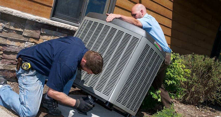 More Heat More Cool team installing a new AC system for Cincinnati and Dayton, Ohio homes