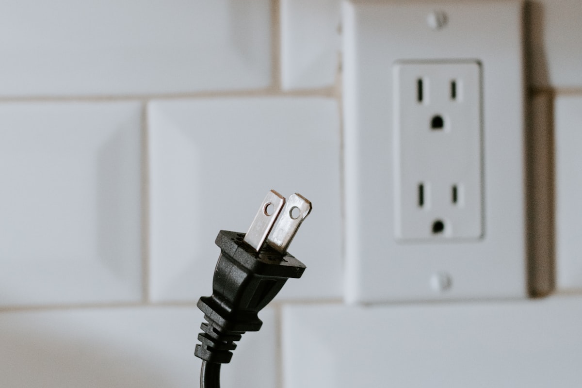 Smart plug in wall outlet eliminating vampire energy for smart home energy management