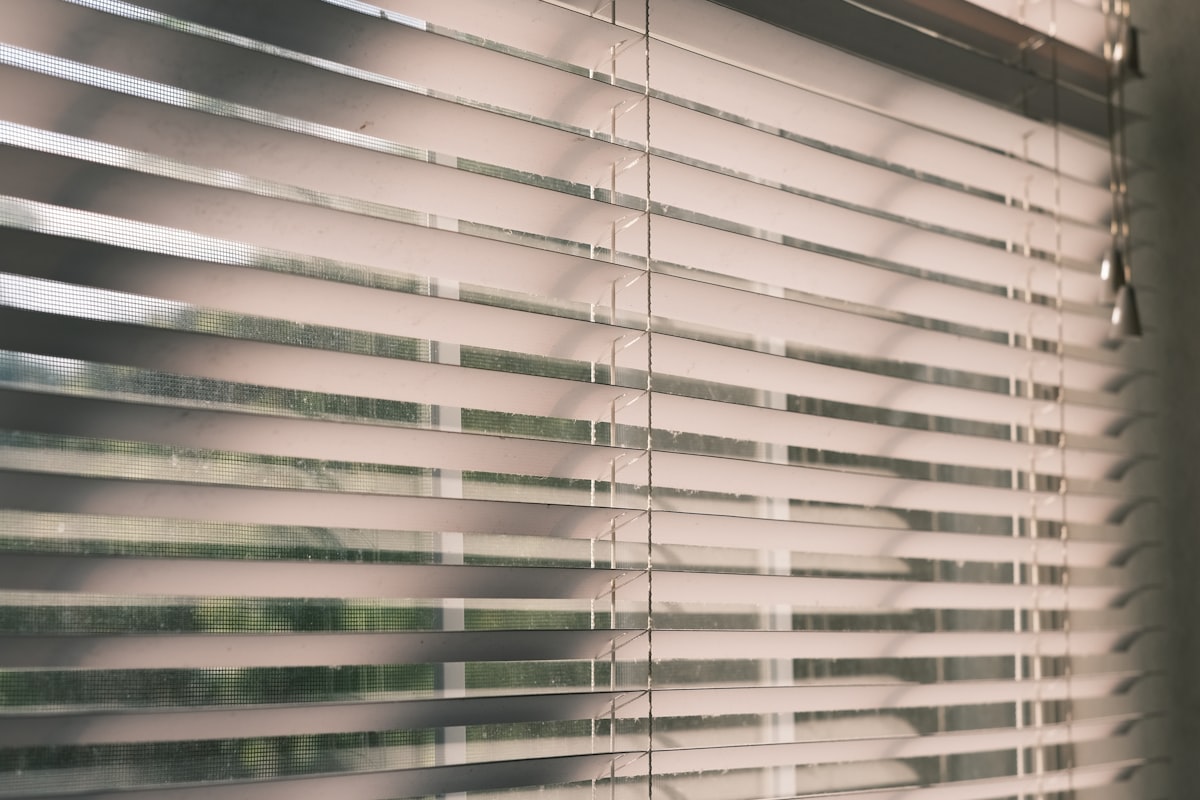 Smart window blinds filtering sunlight to reduce heating and cooling costs