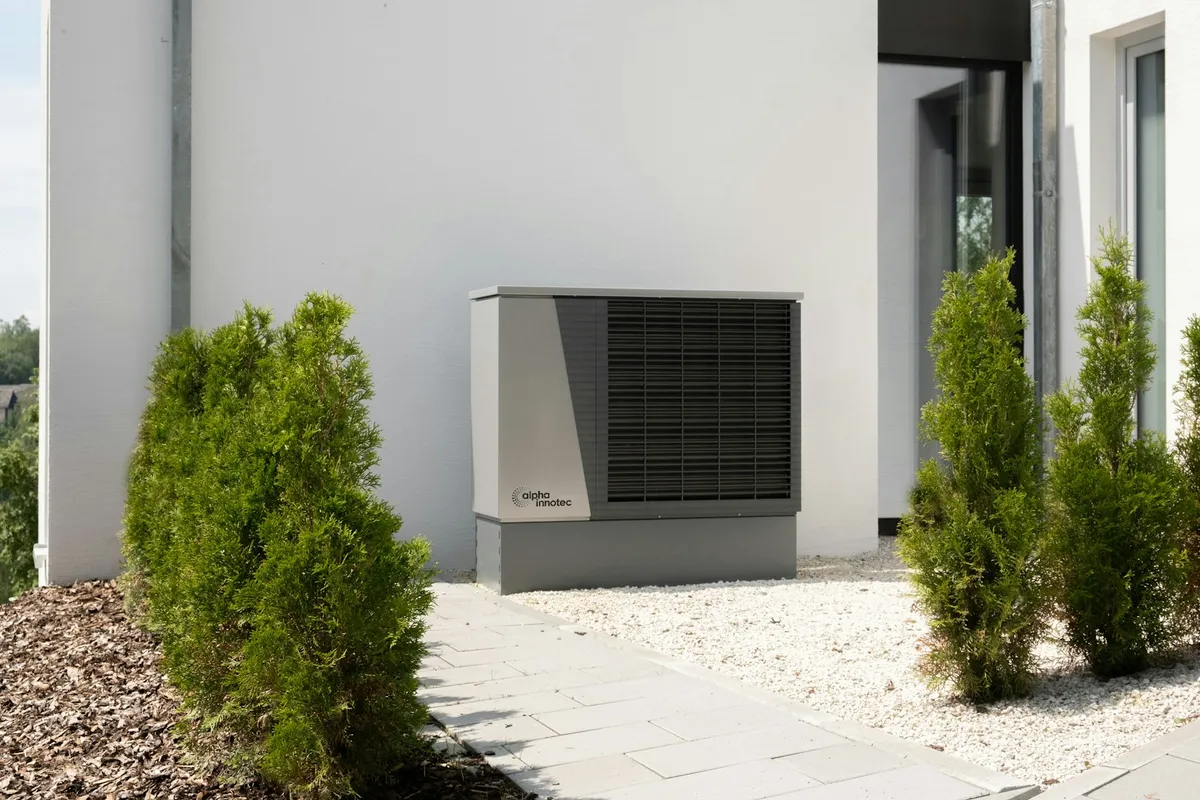 New high-efficiency air conditioner condenser installed beside an Ohio home