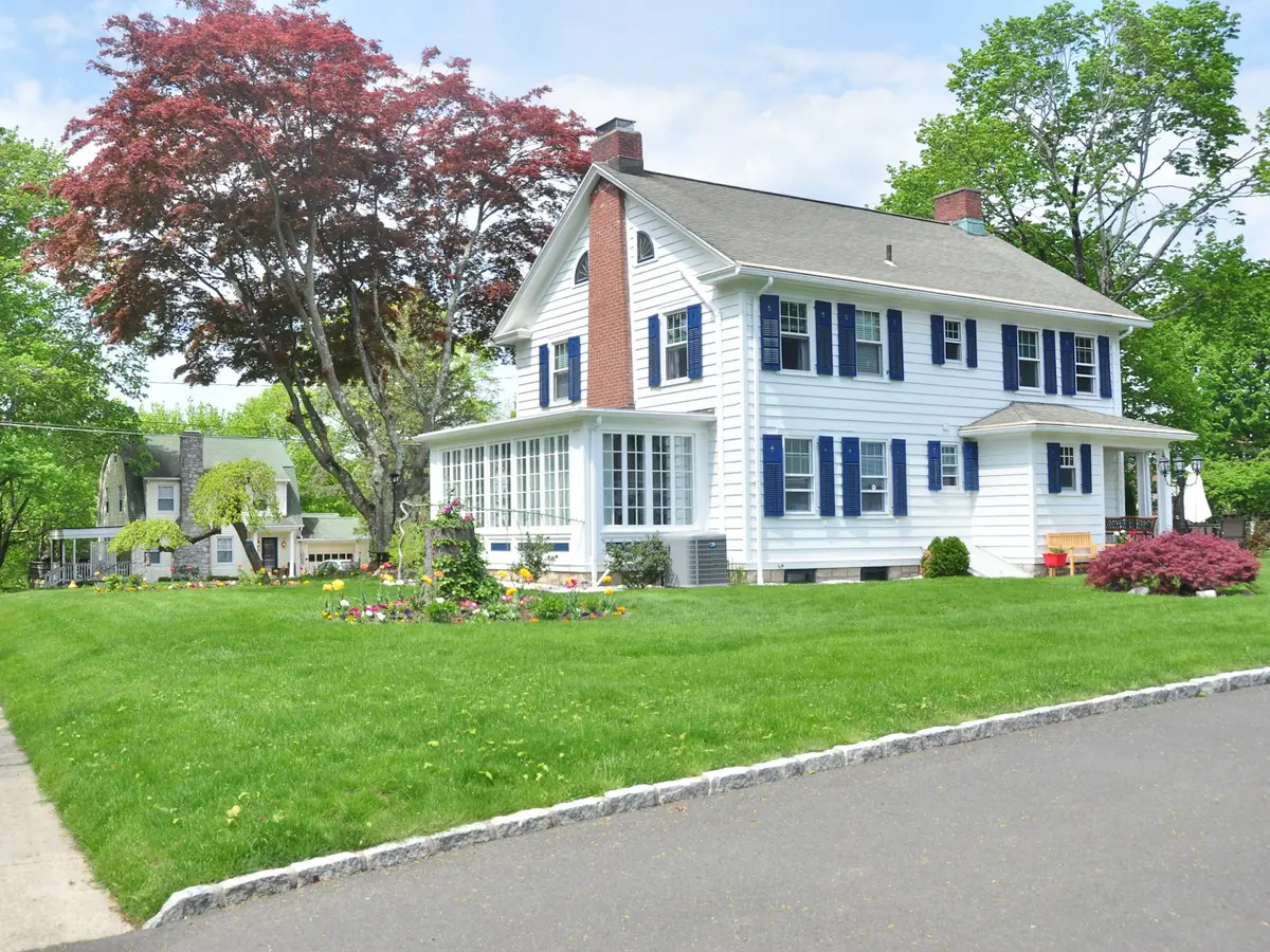 Classic colonial home with a broad lawn, the style we serve across Blue Ash