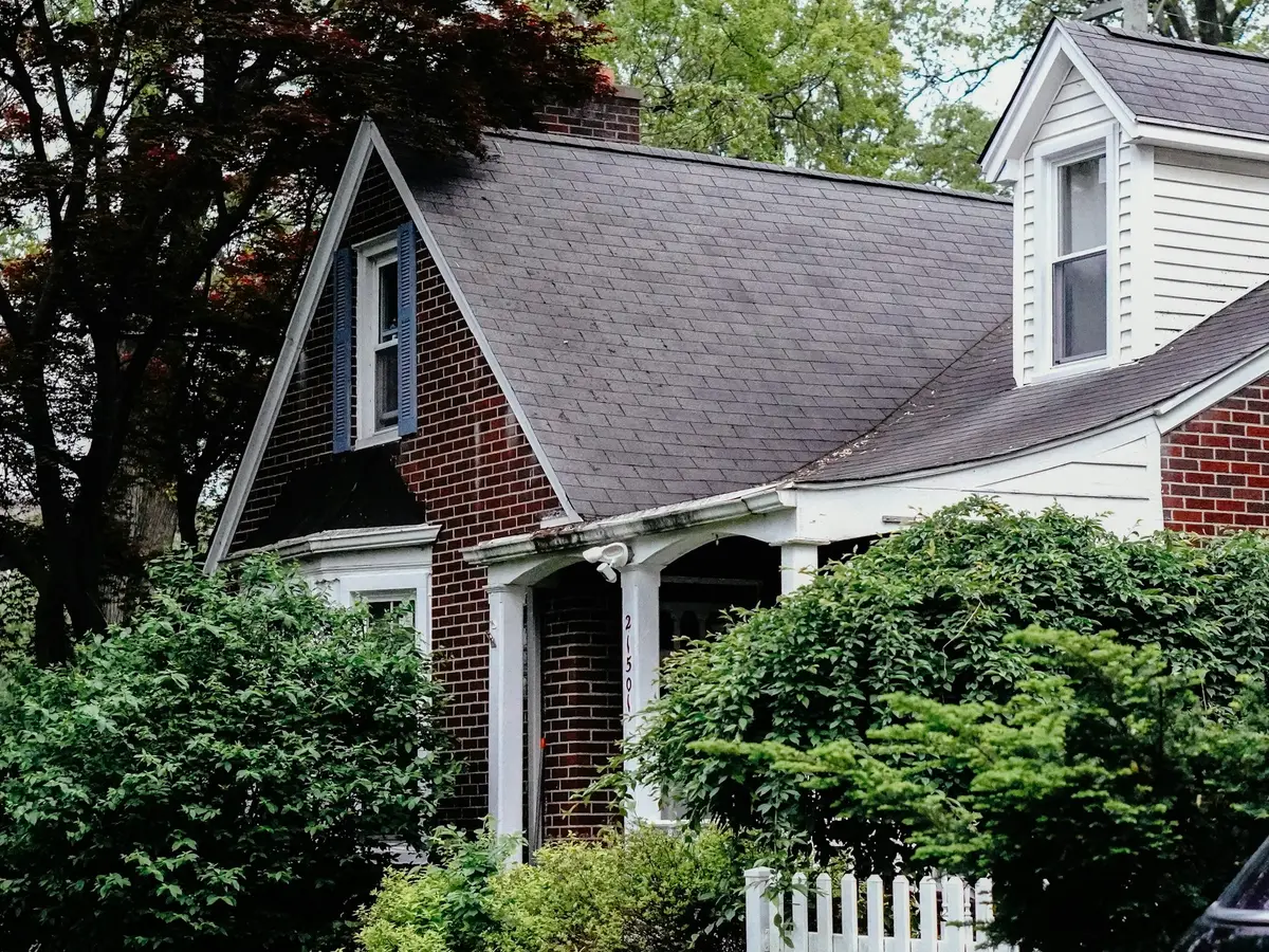 Cape Cod style home tucked into the trees like those around Kings Mills