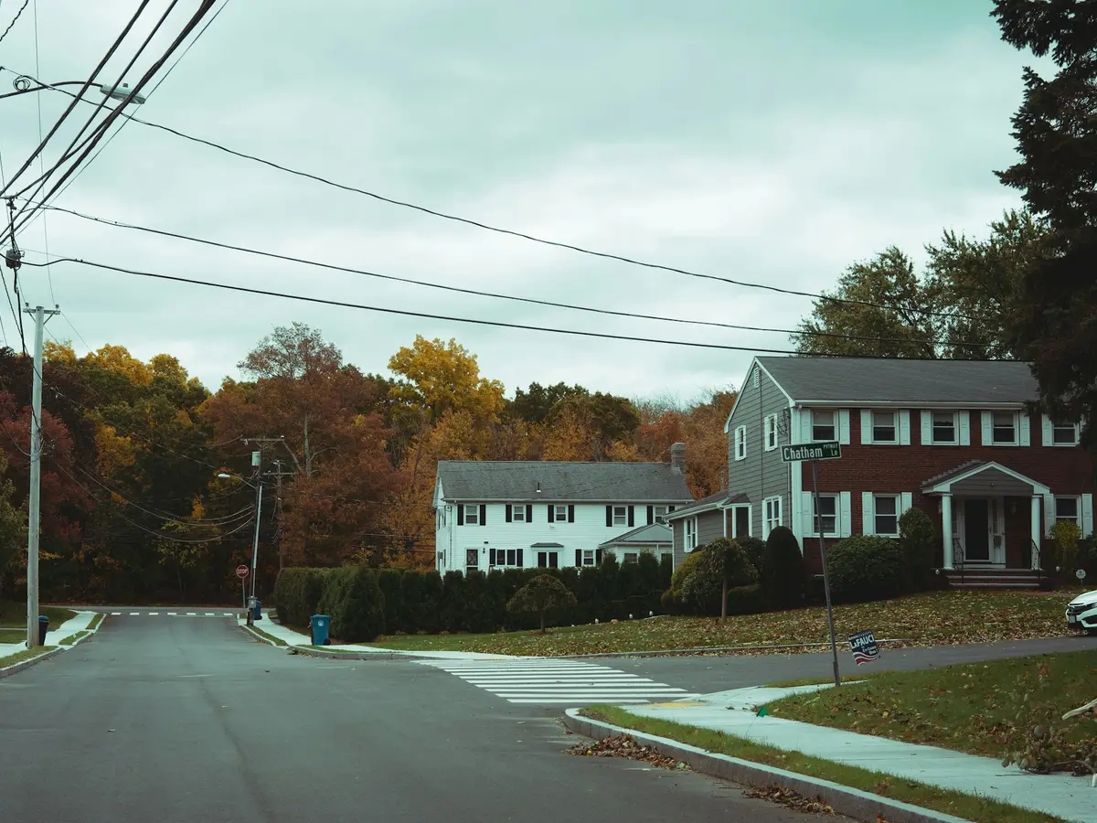 Family colonial at dusk like Springboro’s settled subdivisions