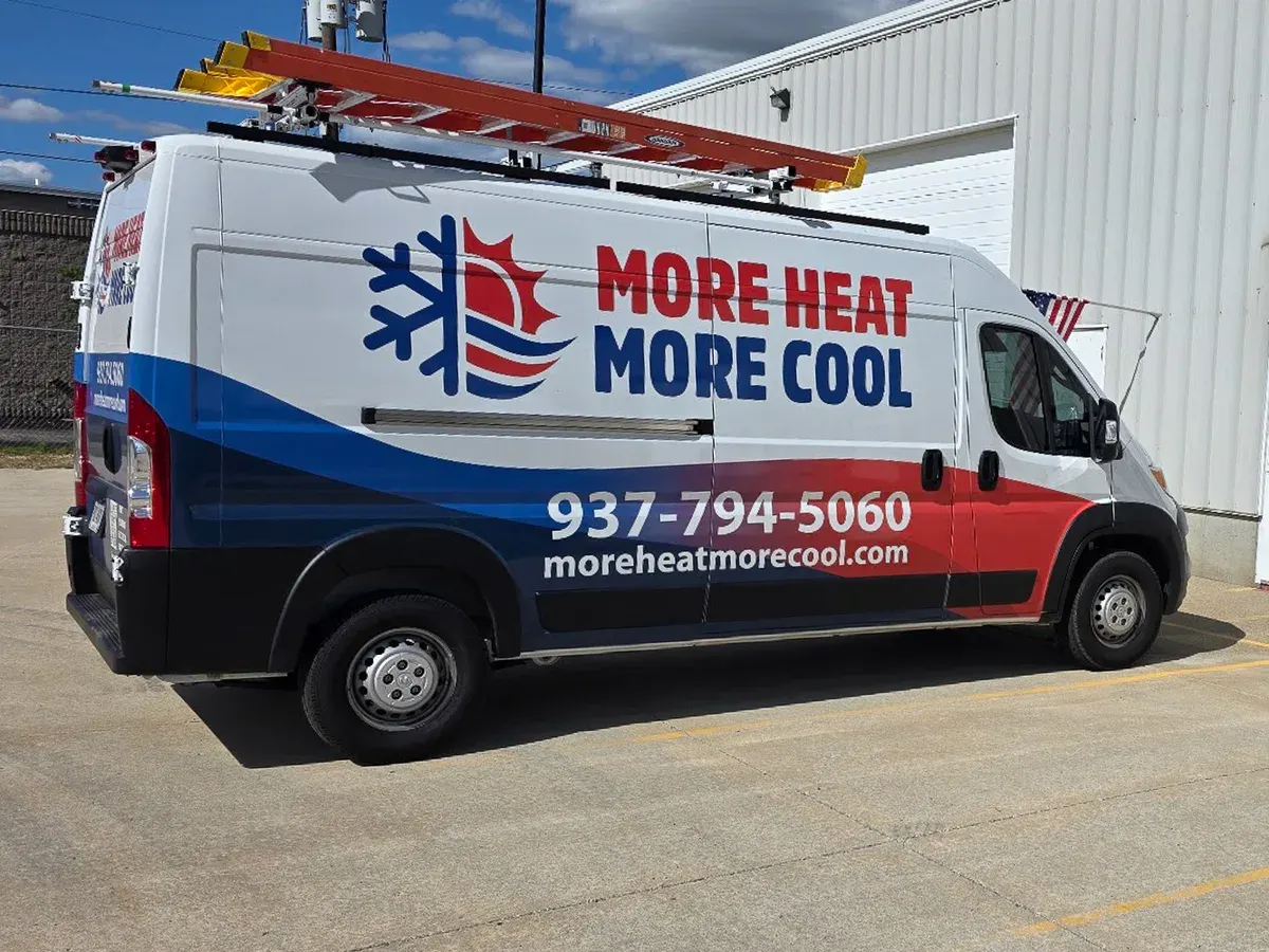 More Heat More Cool service van arriving for an AC Boost appointment
